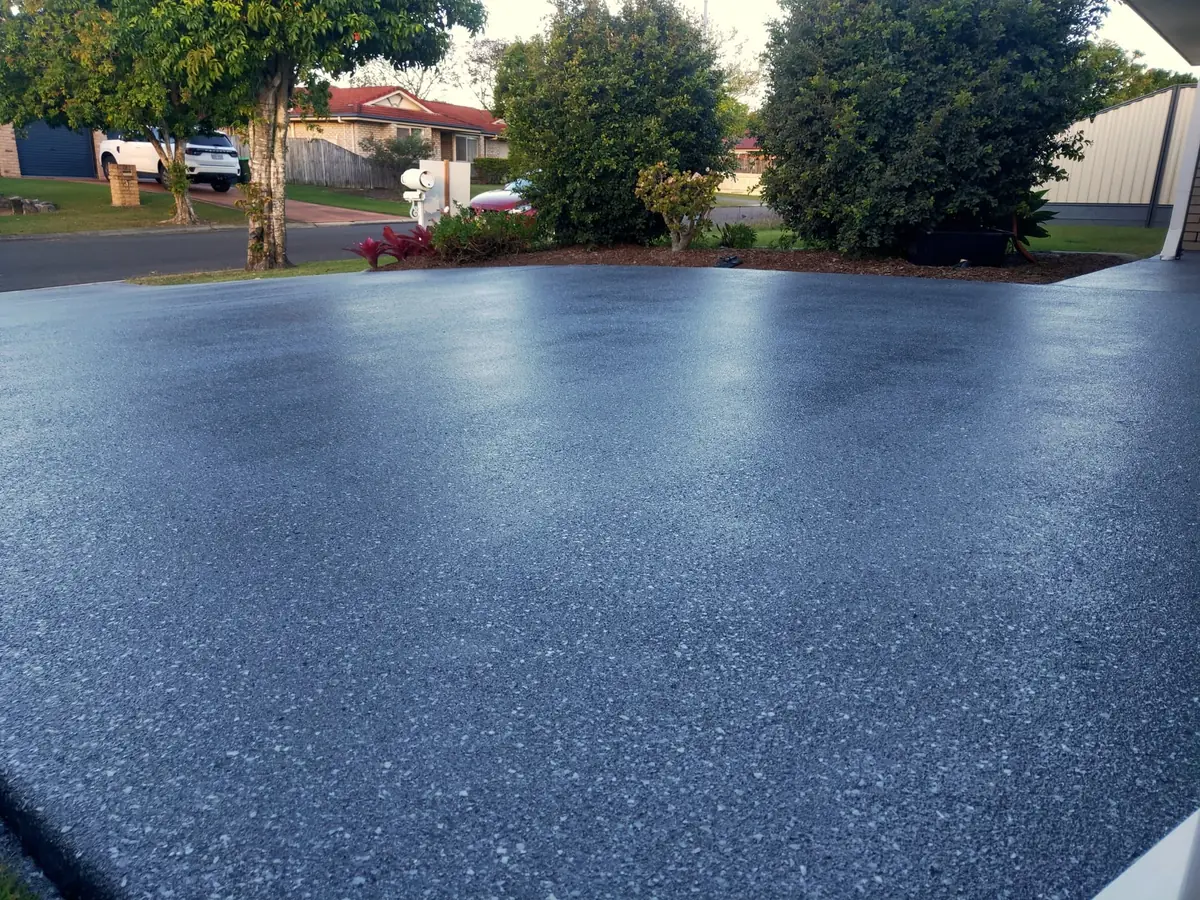 The same driveway finished in a charcoal epoxy flake coating